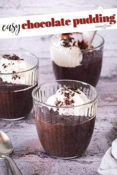 three desserts in small glass bowls with spoons