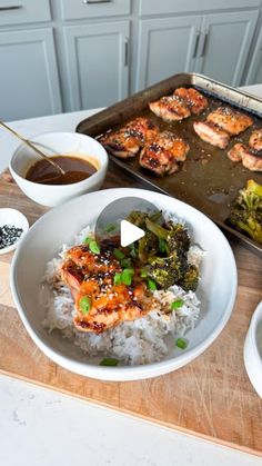 the meal is ready to be eaten on the counter top, including chicken and broccoli