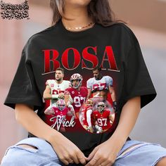 Nick Bosa Vintage Graphic 90s Tshirt, Football Player Homage Graphic T-shirt Unisex, Bootleg Retro 90's Fans Tee, Custom Photo Shirt Material: The Unisex Bella + Canvas 3001 T-shirt is a timeless classic that both men and women will love. Made from a soft and lightweight jersey material, this unisex tee feels incredibly comfortable and has just the right amount of stretch. The ribbed knit collar adds shape and structure, while taped shoulders ensure a better fit over time. Dual side seams keep the garment's shape intact, ensuring it lasts for years to come. You'll love the way this tee fits and feels - it's sure to become a favorite in your wardrobe. SIZING: * To ensure the best fit, please refer to the sizing chart in the product photos. * For ladies who prefer a slimmer fit, we recommend Nick Bosa, 90s Tshirt, Football Player, Vintage Graphic, Retro 90s, Product Photos, Vintage Graphics, Knit Collar, Sizing Chart