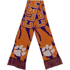 Stay warm in Clemson Tigers fashion with this bold Tonal Camo scarf. This FOCO gear features team graphics and a matching camo design-a must-have for any Clemson Tigers fan.Stay warm in Clemson Tigers fashion with this bold Tonal Camo scarf. This FOCO gear features team graphics and a matching camo design-a must-have for any Clemson Tigers fan.ImportedHand wash, dry flatWoven graphicsCamo patternMaterial: 100% AcrylicBrand: FOCOFringed endsMeasures approx. 66'' (including fringes)Double-sided de Camo Scarf, Orange Scarf, Camo Designs, Clemson Tigers, Tigers, Stay Warm, Scarf Wrap, Scarf Accessory, Camo