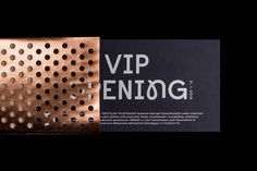 a close up of a metal object on a black background with the words vlp enog written below it