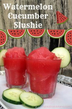 watermelon cucumber slushie in two glasses on a white plate