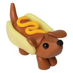 a toy hot dog with mustard and ketchup on it's buns