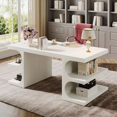 a white desk with bookshelves in front of it and a lamp on top