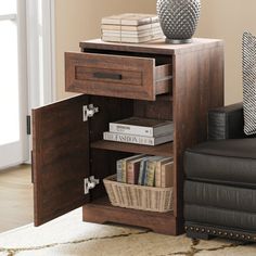 a living room scene with focus on the end table and bookshelf in the corner