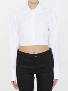 Cropped structured shirt in white organic cotton with boning that runs from the waist to the bust for a sculpting effect. It features classic collar, front button closure and buttoned cuffs. Logo label at the side seam. Fitted cut. The model is 175cm tall and wears size US 6. Size nationality: US  Product number: 8316821  Product code: 1WC2241880100  Composition: 100% cotton Fringe Skirt, Cropped Shirt, Logo Label, Shirt Skirt, Clothes Collection, Crop Shirt, Cardigan Jacket, Jeans Dress, Alexander Wang