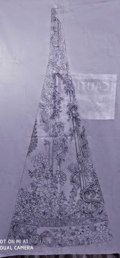 an intricately designed piece of cloth is shown in black and white, as well as the words'not on mai traditional camera '