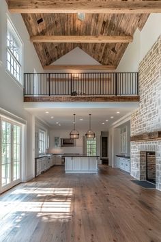 a large open floor plan with wood floors