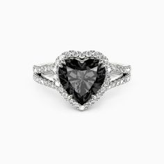 a black and white heart shaped diamond ring