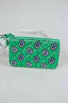 Stay organized and stylish with the Vera Bradley Zip Wallet! Available in two fun colors, this wallet features a convenient ZIP ID CASE to keep all your essentials in one place. Say goodbye to fumbling for your cards and ID - this wallet has got you covered! Green Rfid Blocking Coin Purse For Travel, Compact Green Wallet For Travel, Compact Green Travel Wallet, Green Travel Wallet With Zipper Pouch, Green Zipper Pouch Wallet For Travel, Green Wallets With Zipper Pouch For Daily Use, Green Wallet With Interior Key Chain Holder For Travel, Green Rectangular Wallet With Zipper Pouch, Green Wallet With Zipper Pouch For Personal Use