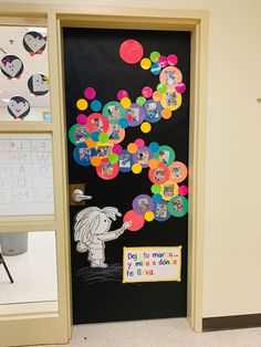 a door decorated with an elephant and bubbles for the classroom's bulletin board display