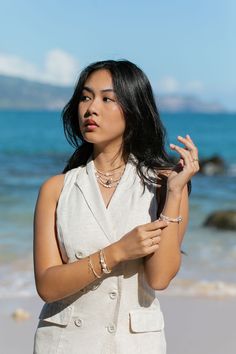 Dotted with natural white puka shells, shimmering gemstones, and golden beads, each of these luxe puka shell gemstone necklaces are one of kind. Each exquisite piece captures the essence of paradise, reminiscent of sun-kissed beaches and gentle ocean breezes. ✦ Choose your Gemstone and Adjustable Length ✦ ✦ DETAILS ✦✧ Name: Ke'alohi (kay ah LO hee) - the brightness. .✧ All golden components 14kt Gold Filled.✧ White Puka Shells.✧ Genuine Gemstones.✧ Due to the nature of the gemstones, each piece may vary from the photos in size/color/shape. Every piece is gorgeous and unique.✧ All Ke Aloha Jewelry pieces come packaged thoughtfully, beautifully, and ready for gift giving.✧ Unless otherwise noted in the listing description, all pieces are sold individually. Photos with models/multiple pieces Mother Of Pearl Jewelry For Vacation, Elegant Shell Jewelry For Vacation, Elegant Shell Necklace With Natural Stones For Beach, Elegant Beach Shell Necklace With Natural Stones, Elegant Beach-style Shell Necklace With Natural Stones, Elegant Pearl Charm Jewelry For Vacation, Elegant Shell Necklace For Vacation, Unique Choker Necklaces, Unique Choker