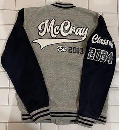 Hi LaborOfLoveCraftHouse Family 💗 PLEASE READ ENTIRE DESCRIPTION BEFORE PURCHASING‼️  Customized Varsity Senior Jacket that can be converted into "Shirt/ Pants Set. Design is Customized at the preference of the customer. If this theme is not what you desire, please add the theme of your choice in the description box.  80% cotton 20% polyester Similar material / thickness to a sweatshirt! NOT A HEAVY JACKET No leather sleeves. Everything is customized with vinyl - no embroidery! Color options please leave in the notes ‼️ If you don't see what you are looking for, please contact me.... All inspired items are made to order.  Please be sure to fill out the personalized section of your order.  THIS IS VERY IMPORTANT ‼️  If you forget you have 12 hours to contact me with the updated information Winter Varsity Jacket With Long Sleeves And School Spirit, Gray Long Sleeve Varsity Outerwear, Gray Letter Print Outerwear For College, Long Sleeve Varsity Jacket With Letter Print For Campus, Letter Print Long Sleeve Varsity Jacket For Campus, Fitted Cotton Varsity Jacket For College, School Spirit Cotton Outerwear, Gray Fall Varsity Jacket For College, School Spirit Cotton Outerwear For College