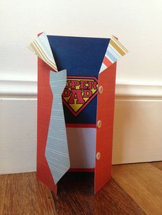 a paper father's day card box with a tie on the front and inside