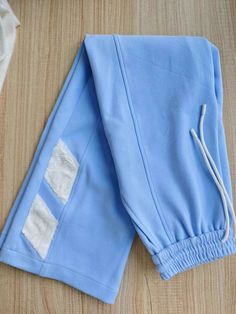 This price is for a pair of pants only, others are not included. Material:PolyesterShorts / Pants Details:Covered Elastic Waist with Drawstring / Slant Front Pockets Size M L XL Full Length 100 102 104 Waist 62 68 74 Hips 100 106 112 Blue Stretch Cotton Joggers, Light Blue Cotton Bottoms For Loungewear, Blue Cotton Bottoms With Side Pockets, Blue Stretch Cotton Sweatpants, Blue Stretch Joggers For Spring, Blue Cotton Tapered Leg Joggers, Spring Stretch Blue Joggers, Blue Cotton Tapered Leg Sweatpants, Light Blue Cotton Sporty Bottoms