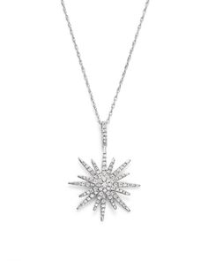 The diffuse shimmer of diamonds radiates from this starburst design on a 14K white gold chain. Elegant Sparkling Starburst Jewelry, Elegant Starburst Sparkling Jewelry, Elegant White Starburst Jewelry, Formal Starburst Diamond Jewelry, Starburst Diamond Necklace With Accents, Diamond Starburst Necklace With Diamond Accents, Diamond Starburst Necklace With Accents, Fine Jewelry Starburst Diamond, Elegant Starburst Jewelry With Brilliant Cut