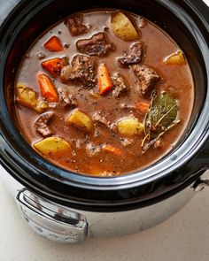 a close up of a stew in a crock pot