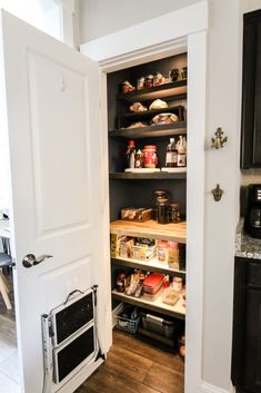 an open pantry with lots of food in it