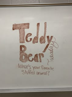 a white board with writing on it that says teddy bear what's your favorite stuffed animal?