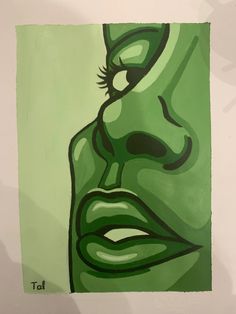 a painting of a woman's face on a green background