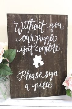 a wooden sign that says, without you our purpose isn't complete please sign a piece