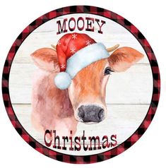 a cow wearing a santa hat with the words mooey christmas written on it