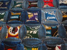 a quilt made out of old jeans with different nfl logos and colors on the back