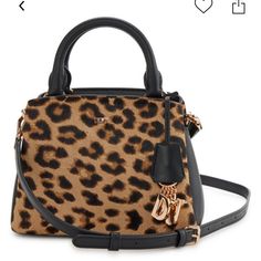 Gorgeous Leopard Print Real Fur, Geniune Calf Hair One Side Blk All Leather Inc. Trim N Lining On Other With Detachable Crossbody Strap 21" Drop Or Carry With Handle 3.5" , Has Feet To Sit Up On Its Own. Has Gold Chain Dkny Charm Fob Attached N Name Plate,This Bag Is Too Cute . Still In All Original Packing From Factory Ready For New Owner Will Ship Out Immediately!.You Need To Add This To Ur Collection Lol. Top Zip Closure With Back Zip N Front Slip Pockets. This Bag Is Perfect Size N Will Hold N Name, Designer Things, Leopard Print Handbags, Dkny Logo, Dkny Bags, Leopard Print Hair, Dkny Bag, Stylish Handbags, Satchel Purse