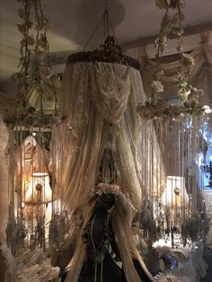 an elaborately decorated room with chandelier and curtains