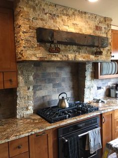 a stove top oven sitting inside of a kitchen next to wooden cabinets and counter tops