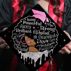 a woman wearing a graduation cap with words written on the front and side of it