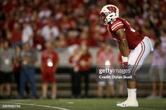 a football player standing on the field during a game