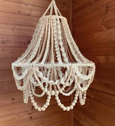 a white chandelier hanging from the ceiling