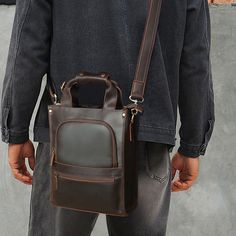 Crazy Horse Leather Shoulder Bag For Mens Leather Handbag Leather Tote Retro Leather Crossbody Bag A Full grain leather messenger bag that expresses perfect harmony between hard and soft. Top-quality full grain leather gives a sentimental feel, but the lines convey a light touch of modern. Timeless and current. Urban practicality with charisma.Briefcases for men are more than an accessory. A leather briefcase bag is an extension of who you are and what you believe in. When we craft leather brief Messenger Bag For Men, Leather Briefcase Bag, Small Messenger Bag, Hiking Bag, Vintage Leather Bag, Briefcase For Men, Handbag Leather, Black Leather Crossbody Bag, Messenger Bag Men