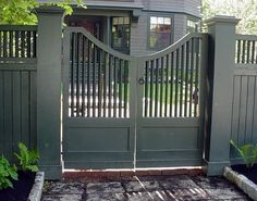 a house with a large gate in front of it