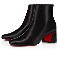 The Turela booty exudes the sophistication and elegance synonymous with Christian Louboutin. With clean 1960’s references, this model reinterprets the classic ankle boot using a minimalist design, encompassing pure, clean lines. The upper is crafted from a soft black calfskin leather with a gently rounded, tapered toe. 55-mm block heels with a rounded back and sculpted curvature. Ankle Boot Heels, Booties Dress, Louboutin Online, Boots Luxury, Short Booties, Ankle Boots Dress, Ladies Boots, Low Boots, Ankle Boots Flat