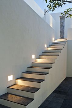 the stairs are lit up with leds to illuminate them from inside and outside