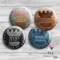 three different colored buttons with the names of four different languages on them, and one has an image of a castle