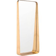 a mirror that is standing up against a white wall with a gold frame on it