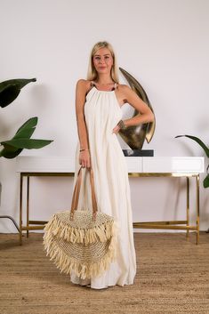 Product Details: I TOO Exclusive Regular fit Sleeveless Back self-tie closure Lined Stretch Model is wearing size S Model Info: Height: 5'10 Weight: 120 lbs Bust: 34 inch Beige Halter Neck Dress For Beach, Beige Halter Dress For Beach, Beige Halter Neck Dress For The Beach, Beige Sleeveless Halter Dress For Beach, Beach Season Halter Neck Maxi Dress With Adjustable Straps, Summer Halter Dress With Adjustable Straps, Summer Sleeveless Halter Dress With Adjustable Straps, Casual Sleeveless Halter Dress With Tie Back, Sleeveless Tie Back Halter Dress For Beach