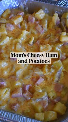 a casserole dish with ham and potatoes in it on a pan that says mom's cheesy ham and potatoes