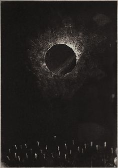 an eclipse in the night sky with many candles around it, as seen from above