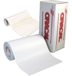 a roll of white paper next to a box