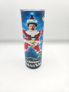 a plastic cup with an image of santa claus on it