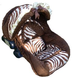 an infant car seat with zebra print on it