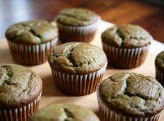 banana smoothie muffins with a secret green ingredient on a wooden tray, ready to be eaten