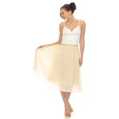 This midi-length skirt combines style, comfort, and convenience, making it a must-have piece for your collection. Crafted from lightweight chiffon fabric, this skirt offers a soft and flowy feel that drapes beautifully. The skirt is lined for added comfort and coverage, ensuring you can wear it with confidence no matter where you go. Whether you're attending a wedding, going to the office, or enjoying a night out with friends, this skirt is your go-to choice. Chic Beige Stretch Pleated Skirt, Chic Stretch Beige Pleated Skirt, Sheer Feminine Skirt For Spring, Feminine Sheer Skirt For Spring, Spring Sheer Stretch Skirt, Chic Sheer Flowy Maxi Skirt, Chic Sheer Flowy Skirt, Elegant Chiffon Midi Pleated Skirt, Chic Summer Pleated Tulle Skirt