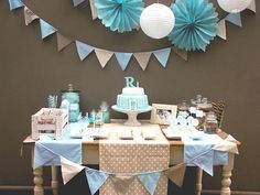 a table with blue and white decorations on it