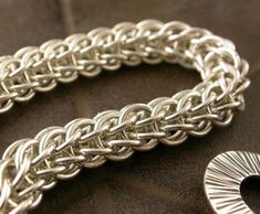 Full Persian Chain Maille Bracelet: Step-by-Step TUTORIAL! Very detailed step-by-step instructions, with plenty of clear, close up color photos will walk you through this project. I am also available for online support, if you need additional help!! This weave is appropriate for a confident beginner, or intermediate chain maille weaver.  Believe me, it will become one of your favorite pieces! And just think about the **gift** possibilities!! Chainmaille Patterns, Chain Maille Patterns, Chain Maille Bracelet, Chainmail Jewelry, Starburst Necklace, Gold Starburst, Handmade Jewelry Ring, Easy Jewelry, Chainmaille Bracelet