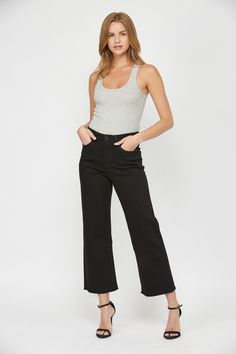 A timeless essential, the Black Beauty Wide Leg Crop Jeans bring effortless sophistication to everyday dressing. Crafted with a lightweight cotton-blend in a classic dark wash, this luxurious style is designed to contour your figure for a flattering fit. Style them with a breezy blouse and polished pumps for a chic ensemble. 69% Cotton, 30% Polyester, 1% Spandex Black Wide Leg Jeans, Blue Health, Crop Jeans, Wide Leg Denim, Black Beauty, Denim Outfit, Cropped Jeans, Wide Leg Jeans, Long Tops